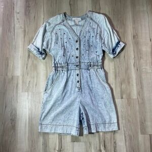 Vintage 1980s studded, acid washed denim jumpsuit with button-up front